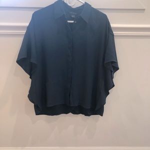 Navy caftan sleeve blouse.